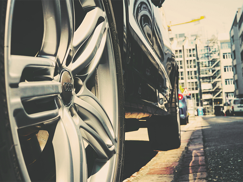 Car Parked in Front of Building